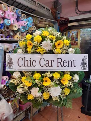 ร้านพวงหรีดวัดราษฎร์นิยมธรรม ศรีราชา ชลบุรี พวงหรีดจากchic Car Rent